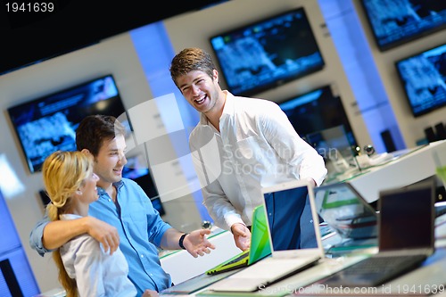 Image of Young couple in consumer electronics store