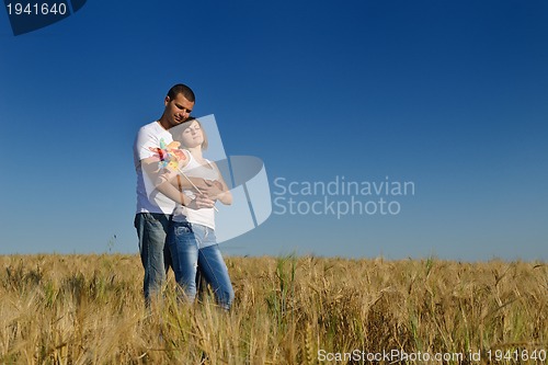 Image of happy couple in wheat field