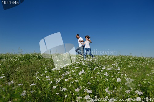 Image of happy couple in wheat field