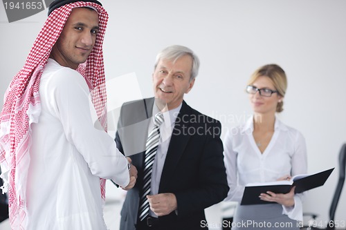 Image of Arabic business man at meeting