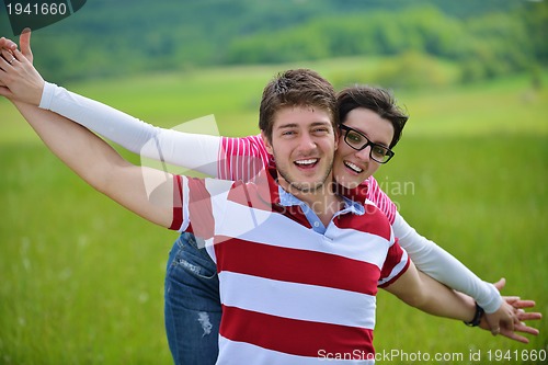 Image of romantic young couple in love together outdoor