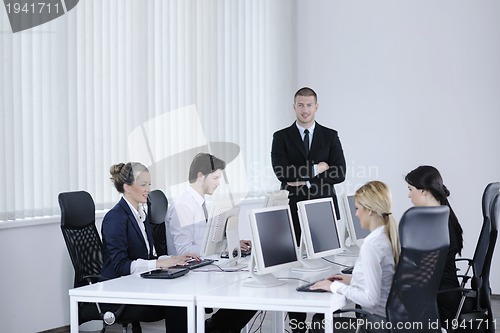 Image of business people group working in customer and help desk office