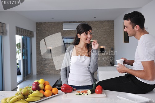 Image of young couple have fun in modern kitchen