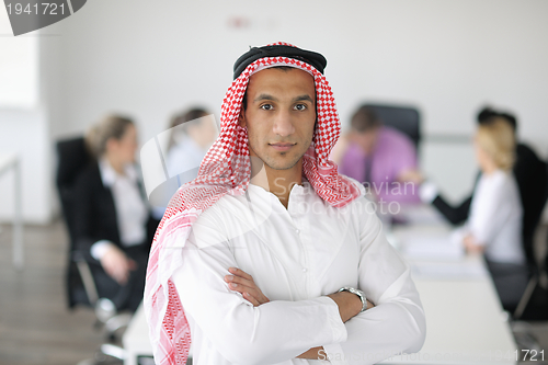 Image of Arabic business man at meeting