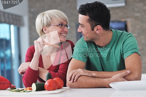 Image of young couple have fun in modern kitchen