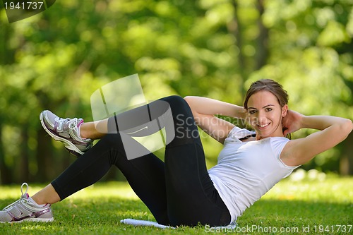 Image of woman stretching before fitness