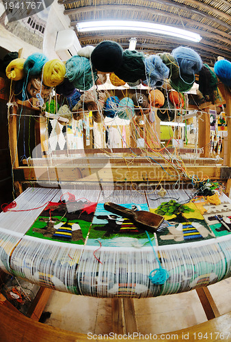 Image of traditional arabic rug production