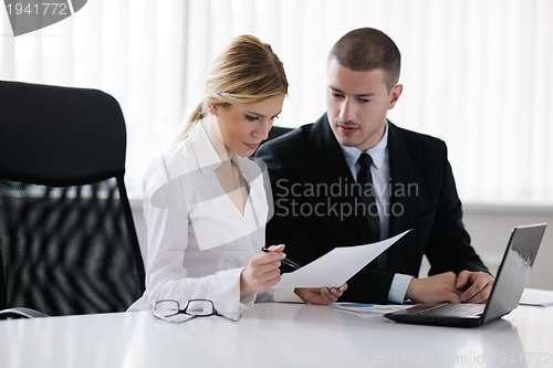 Image of business people in a meeting at office