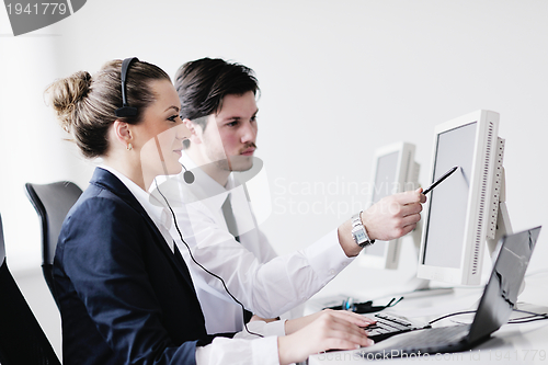 Image of business people group working in customer and help desk office