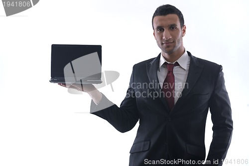 Image of business man work on mini laptop