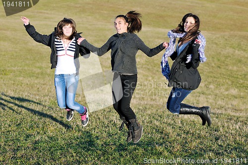 Image of group of teens have fun outdoor