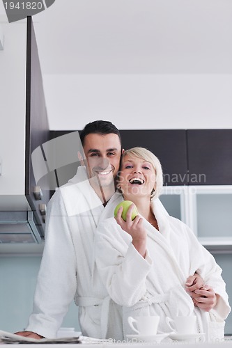Image of young couple have fun in modern kitchen