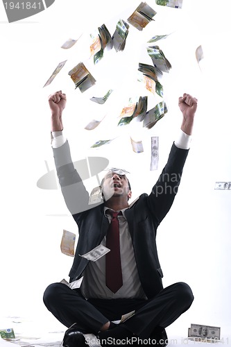 Image of Business man holding money