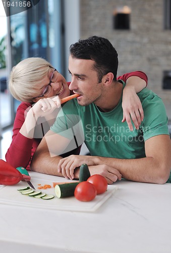 Image of young couple have fun in modern kitchen