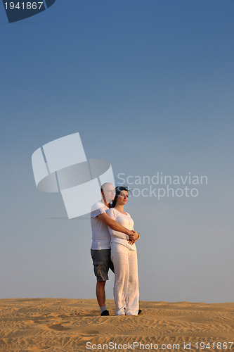Image of couple enjoying the sunset