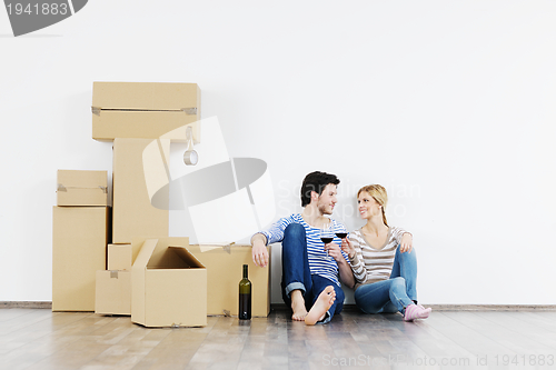 Image of Young couple moving in new house