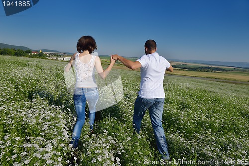 Image of happy couple in wheat field