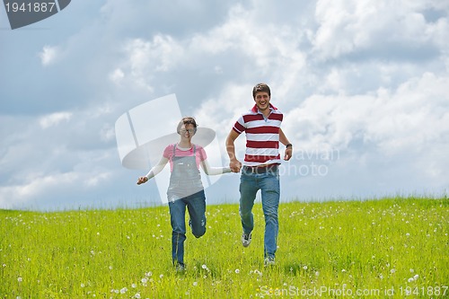 Image of romantic young couple in love together outdoor