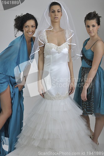 Image of portrait of a three beautiful woman in wedding dress