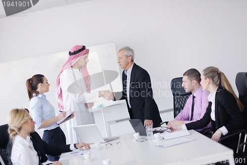 Image of Arabic business man at meeting