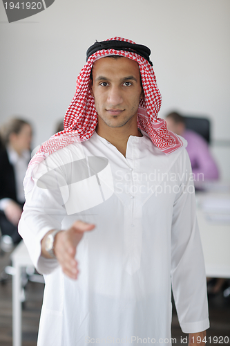 Image of Arabic business man at meeting
