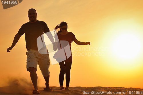 Image of couple enjoying the sunset