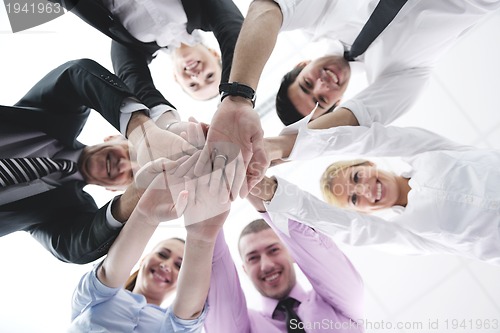 Image of business people group joining hands