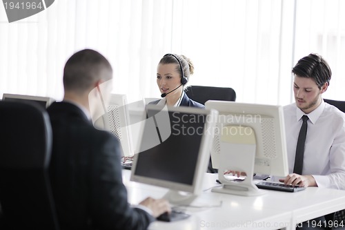 Image of business people group working in customer and help desk office