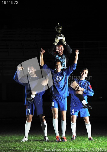 Image of football players celebrating the victory