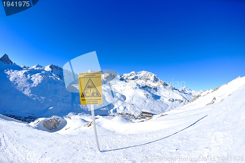 Image of Sign board at High mountains under snow in the winter