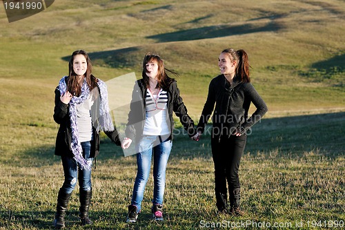 Image of group of teens have fun outdoor
