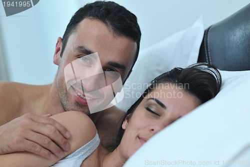 Image of young couple have good time in their bedroom