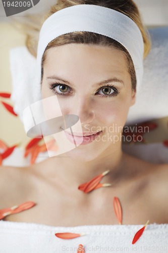 Image of Beautiful young woman in spa