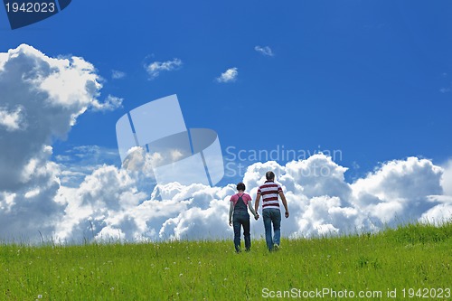 Image of romantic young couple in love together outdoor