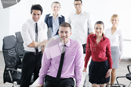 Image of young business man at meeting