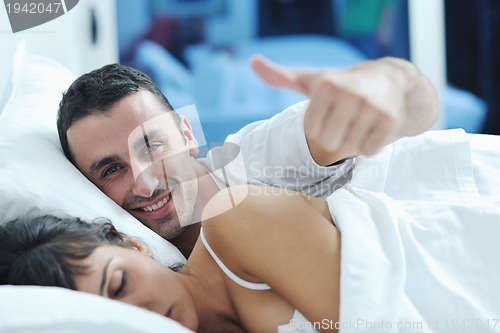 Image of young couple have good time in their bedroom