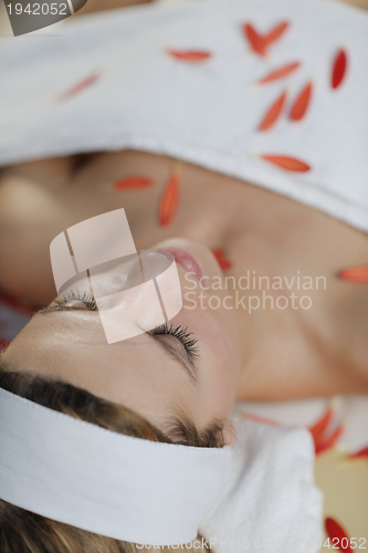 Image of Beautiful young woman in spa