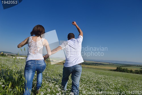 Image of happy couple in wheat field