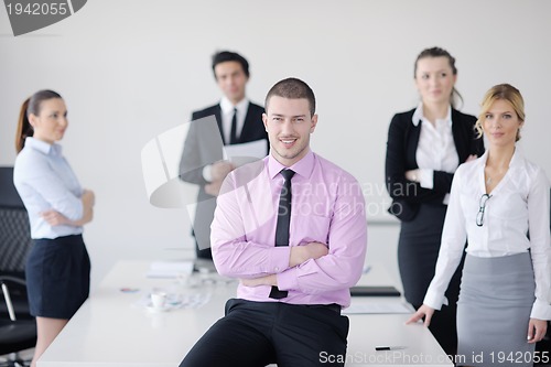 Image of young business man at meeting