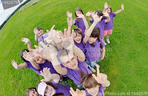 Image of happy kids group  have fun in nature