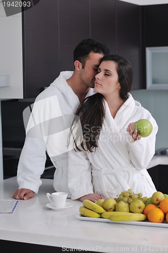 Image of young couple have fun in modern kitchen