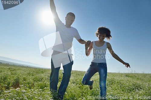 Image of happy couple in wheat field