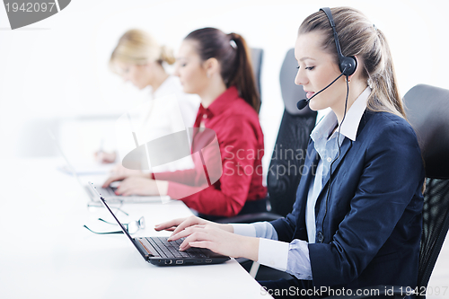 Image of business woman group with headphones