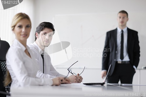 Image of business people in a meeting at office