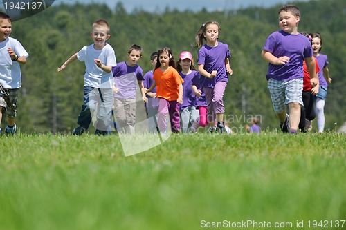 Image of happy kids group  have fun in nature