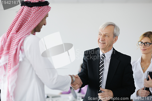 Image of Arabic business man at meeting