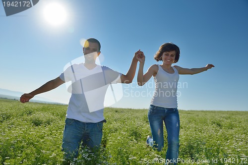 Image of happy couple in wheat field