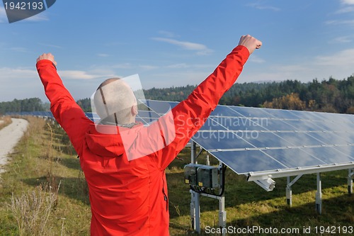 Image of Male solar panel engineer at work place