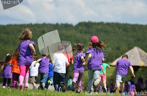 Image of happy kids group  have fun in nature