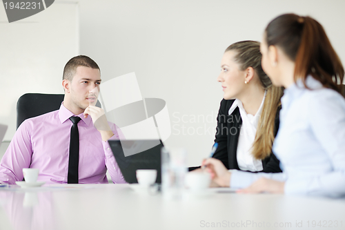 Image of Group of young business people at meeting